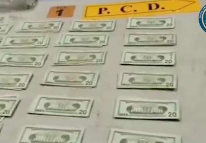 Imágenes del dinero decomisado durante el operativo.