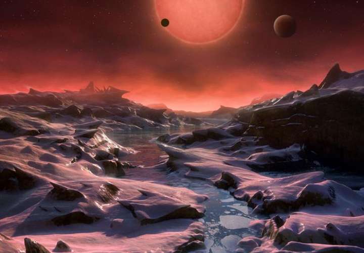 Fotografía facilitada por la ESO de una ilustración de la estrella enana ultrafría TRAPPIST-1 desde la superficie de uno de sus planetas.  /  Foto: EFE