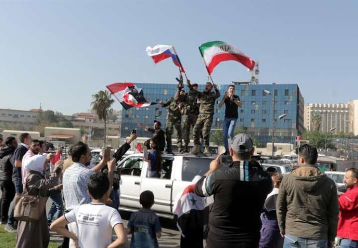 Sirios de varias zonas se manifiestan a favor del presidente Bachar al Asad