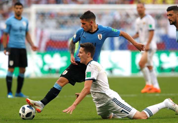 El uruguayo Lucas Torreira tuvo un partido inolvidable contra Portugal en octavos de final. Foto EFE