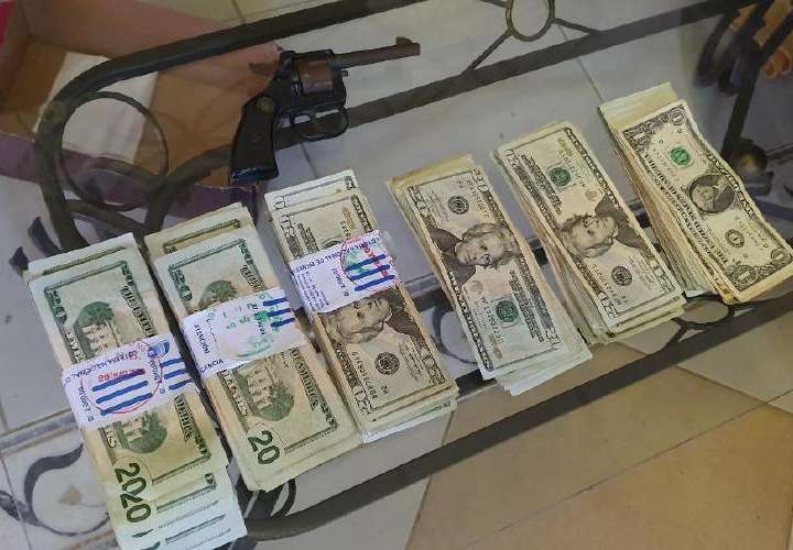 Dos capturados con más de $9 mil y armas de fuego