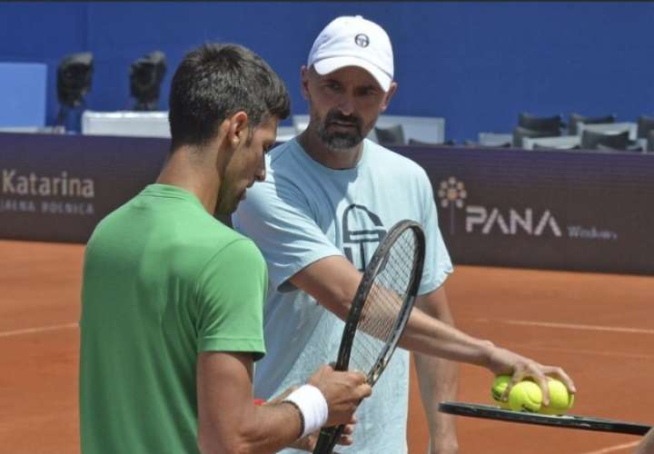 Novak Djokovic (izq.) y su entrenador Goran Ivanisevic. 