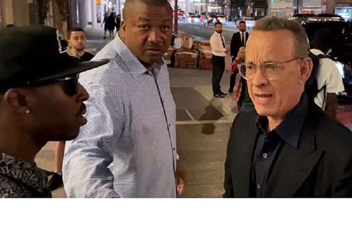 Fanáticos cabrean a Tom Hanks, empujan a su esposa y los confronta