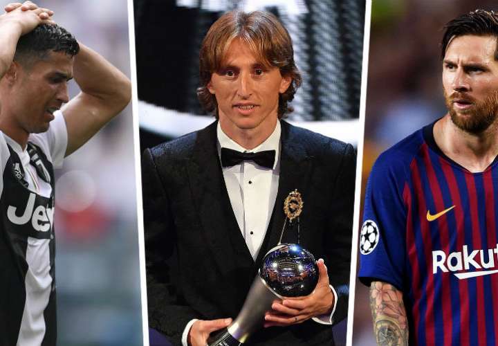 Luka Modric (c), Cristiano Ronaldo (izq.) y Leionel Messi. 