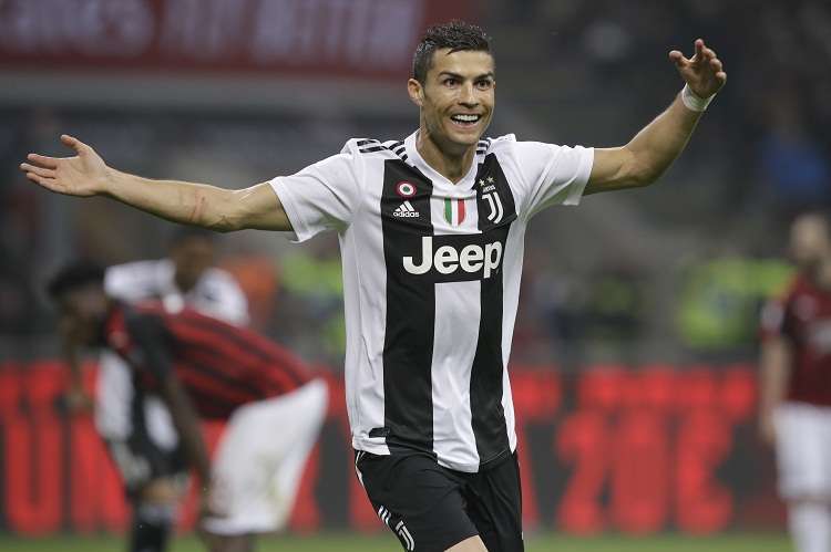 Cristiano Ronaldo festeja su gol contra AC Milan. Foto: AP