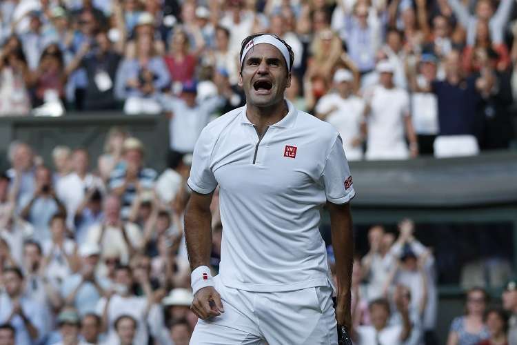 Roger Federer celebra su triunfo sobre el español Rafael Nadal. Foto: AP