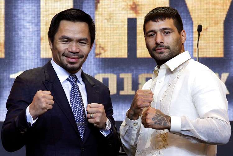 El filipino Manny Pacquiao (izquierda) y el argentino Lucas Matthysse, campeón mundial welter de la AMB. Foto: AP